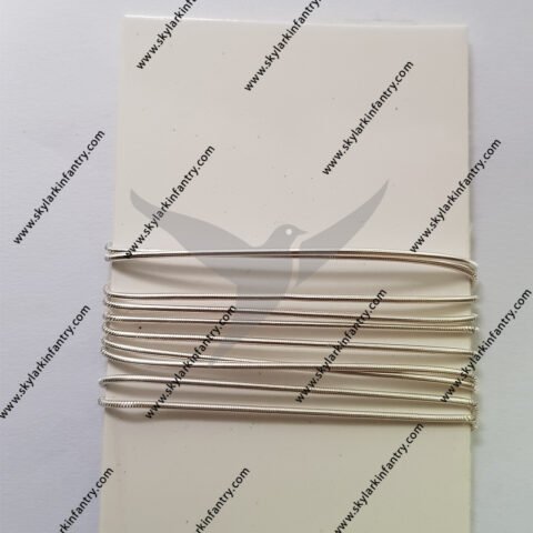 Lingotes sin brillo bordados en plata